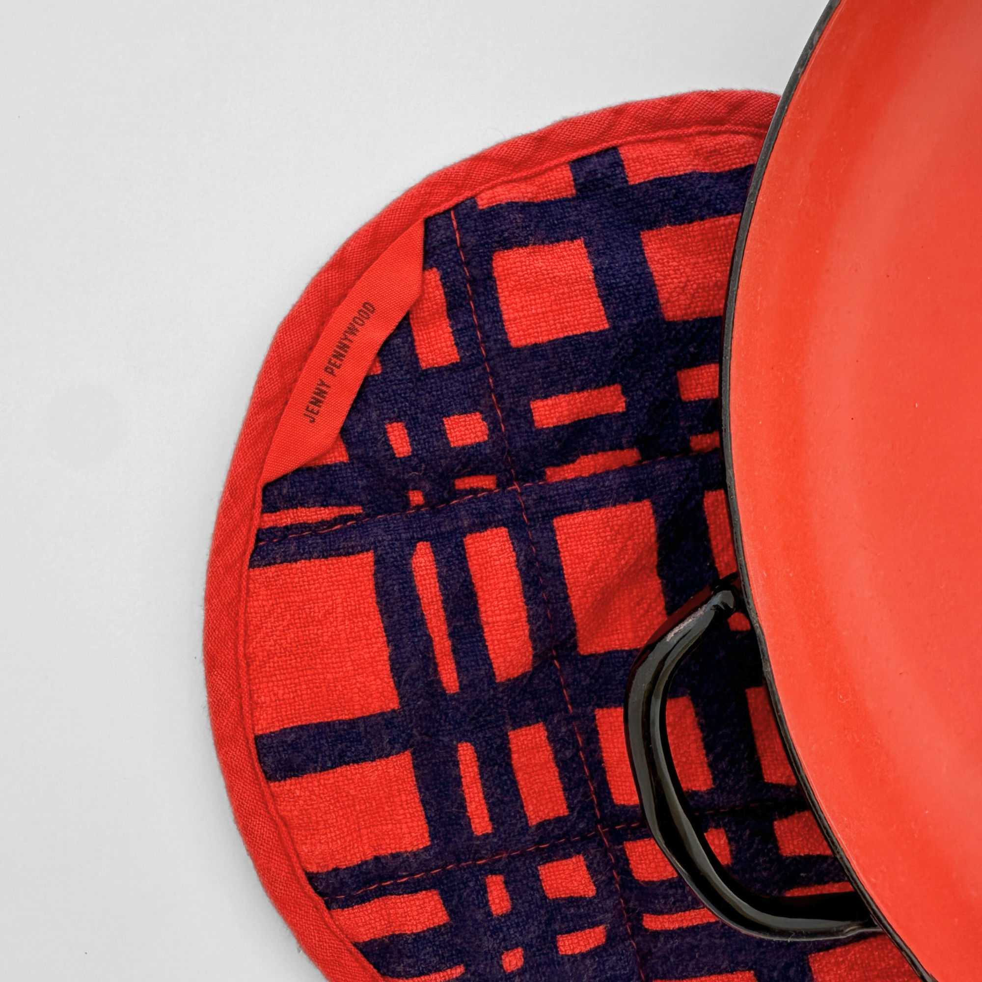 Circle Potholder - Darby - Midnight - Tomato