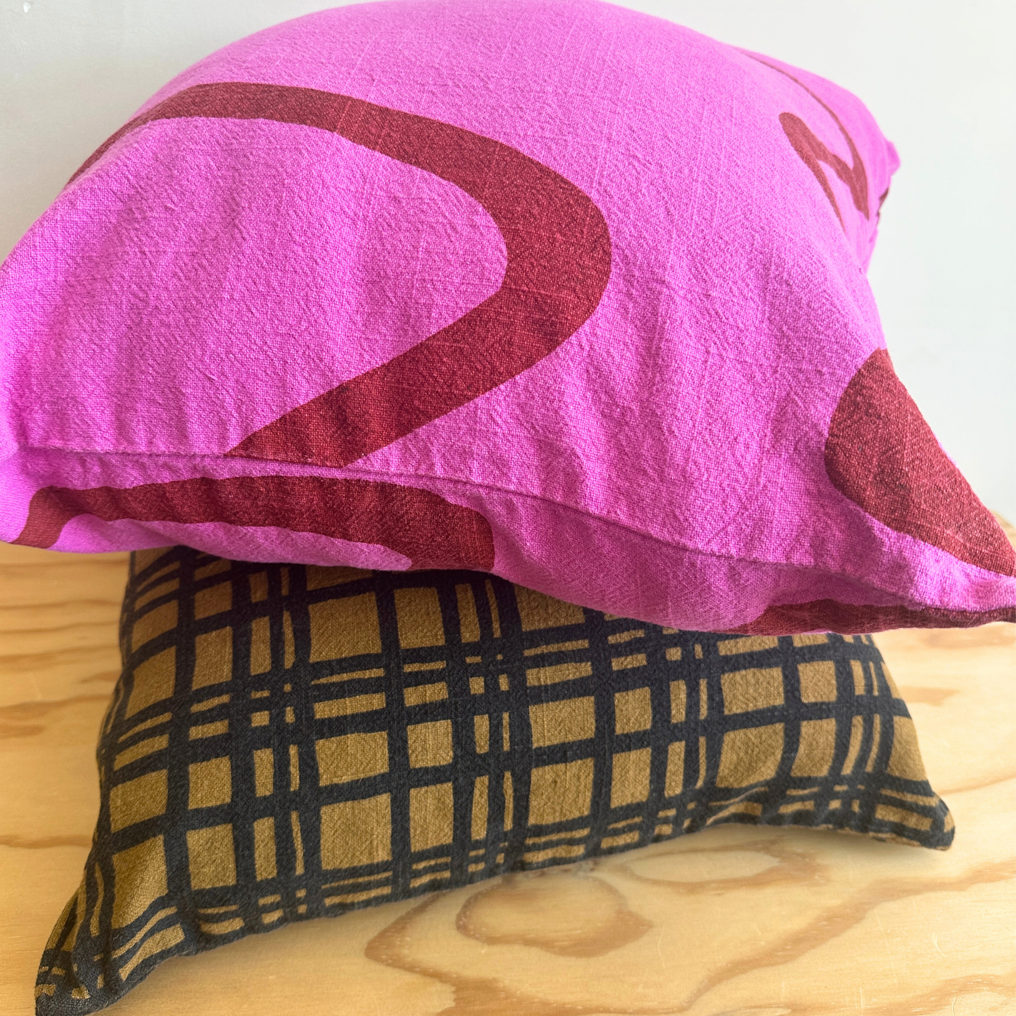 The Square Throw Pillow - Ziggy in Brick & Fuchsia