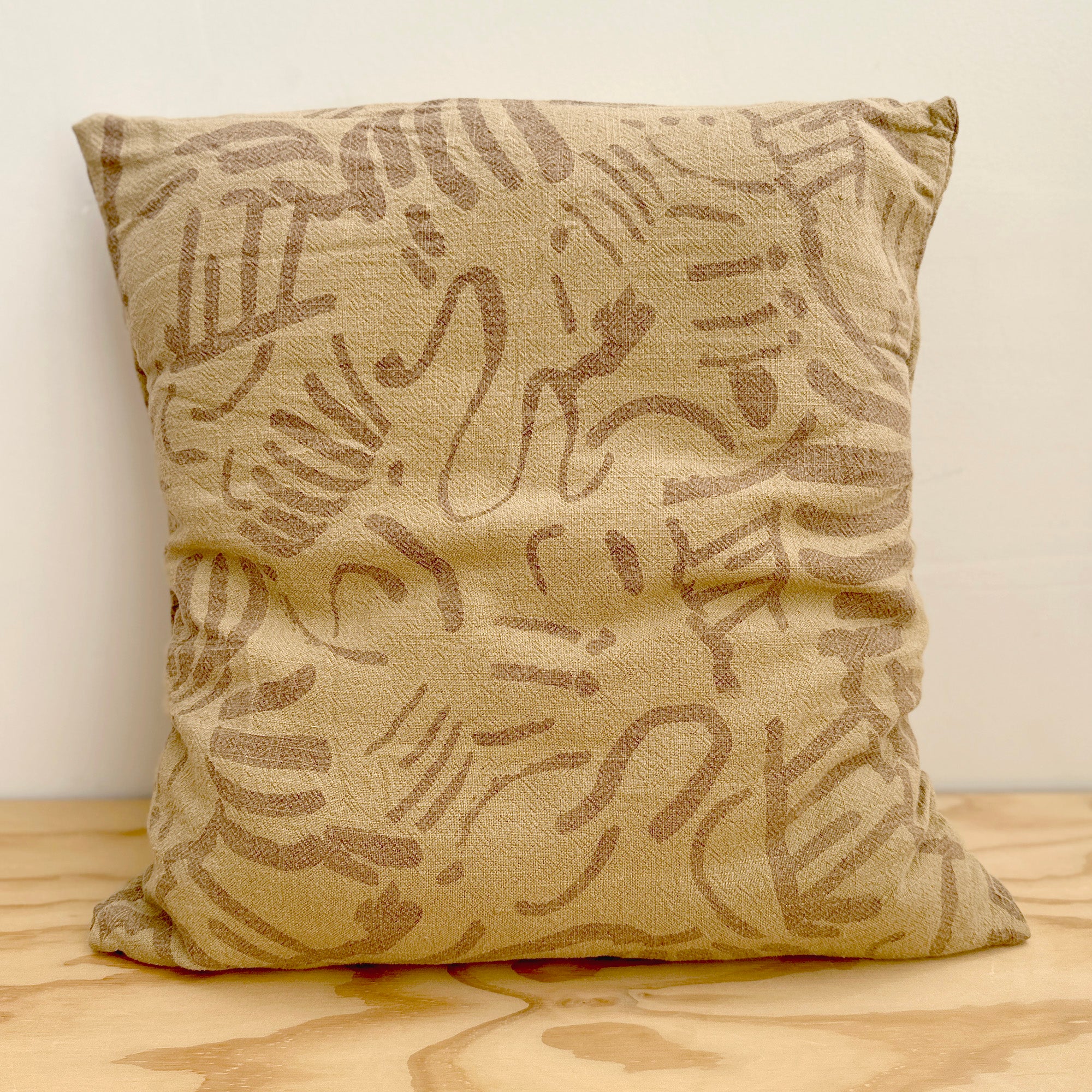 The Square Throw Pillow - Fold in Clay and Camel