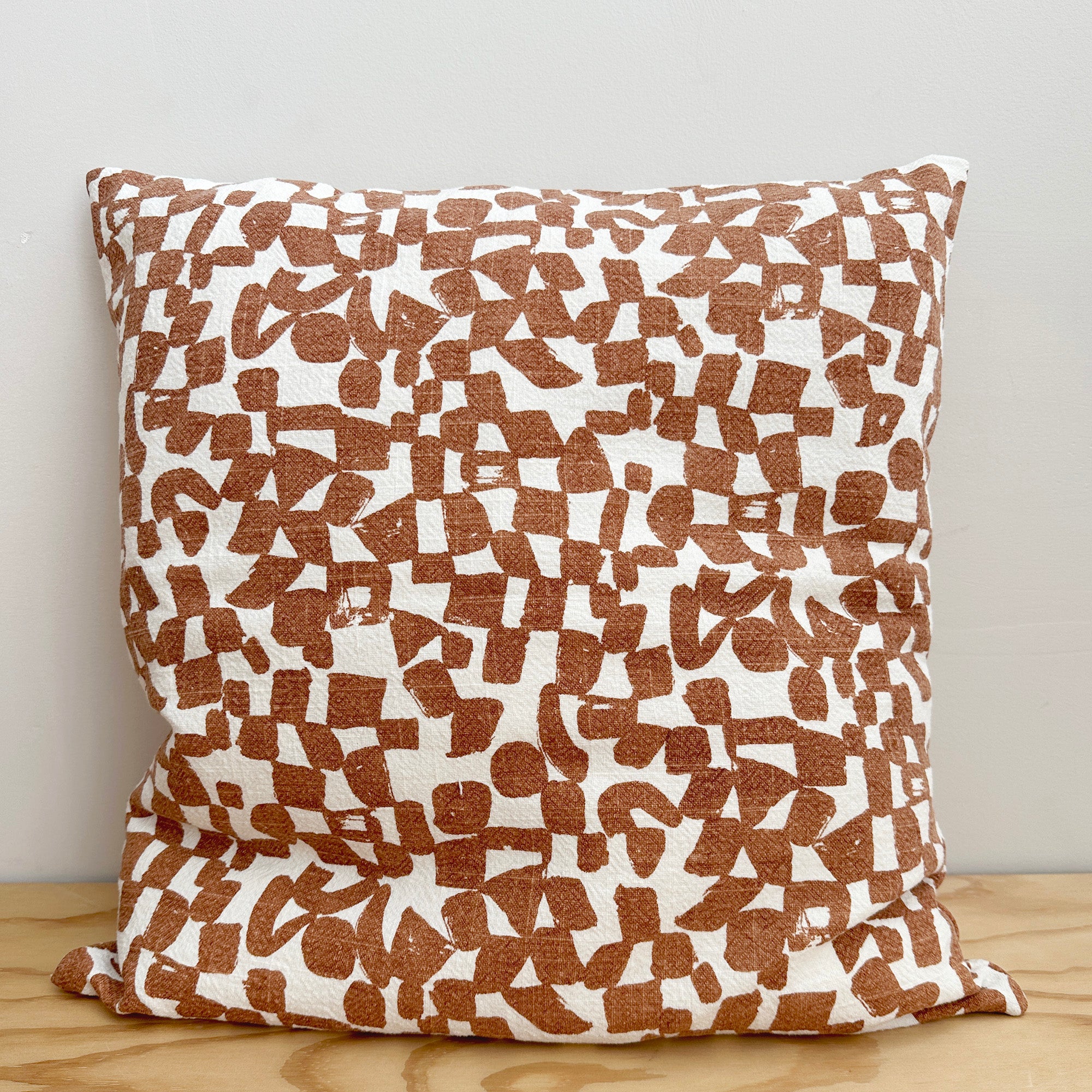 The Square Throw Pillow - Checks in Amber and Bare