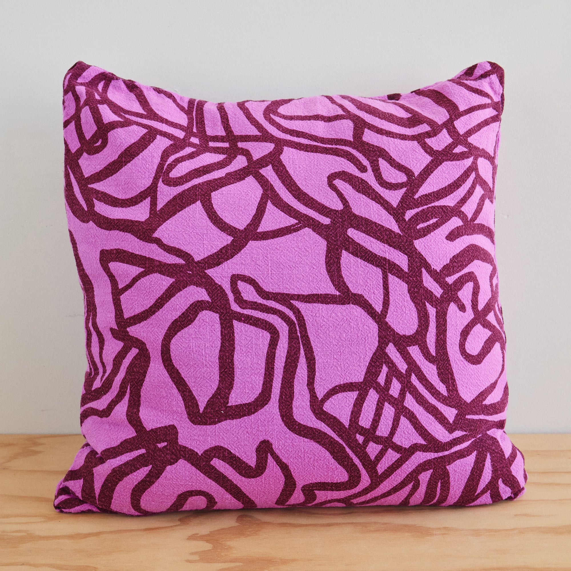 The Square Throw Pillow - River in Maroon and Fuchsia